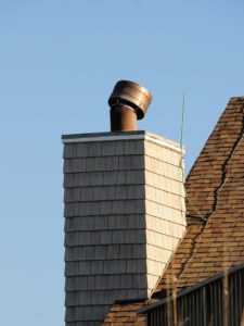 Oceanfront chimney cap damaged